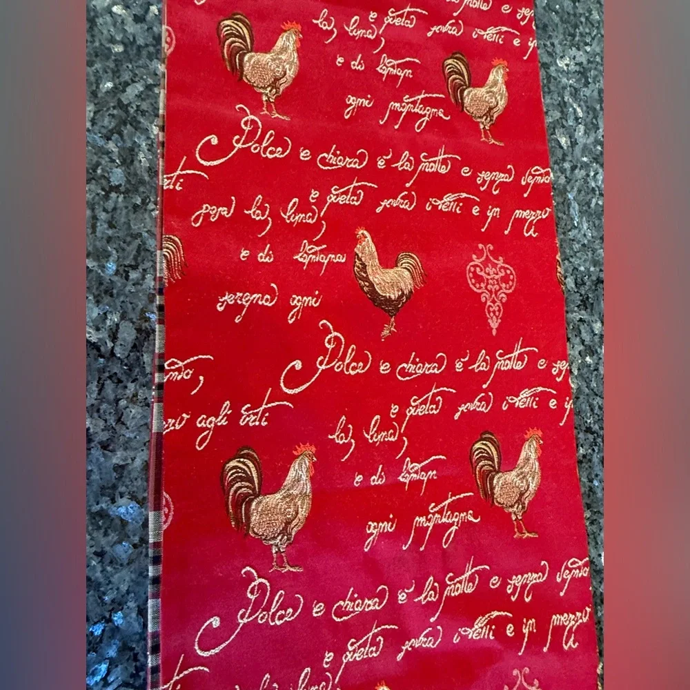 Red jacquard table runner featuring a traditional French rooster design 104x12”